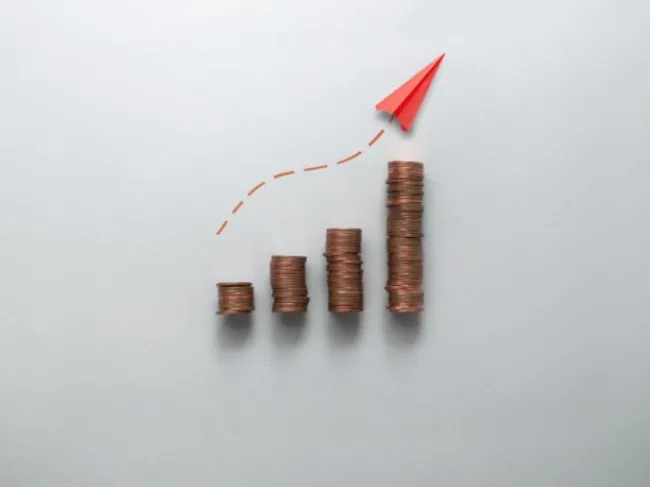 increasing stacks of coins